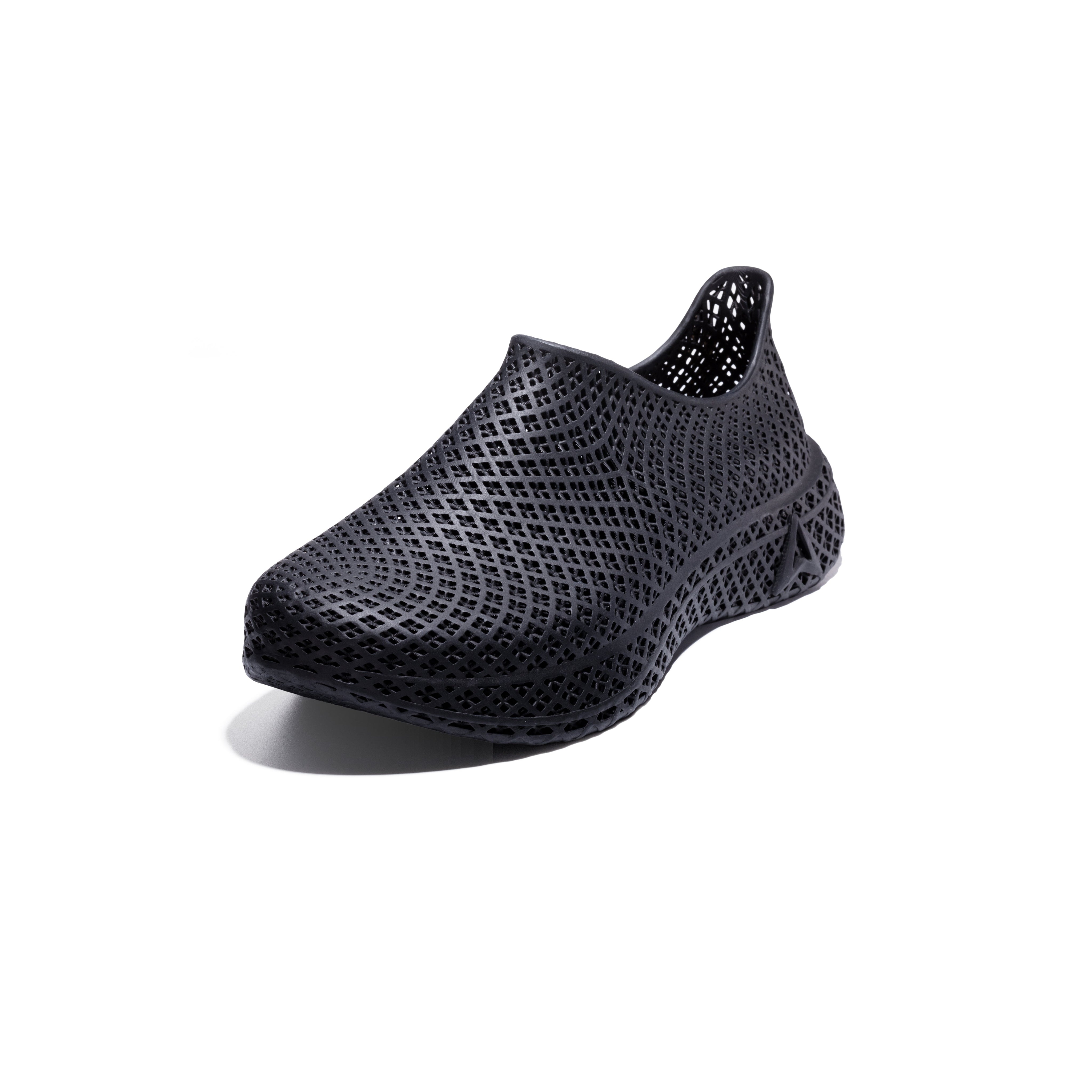 3D printed slip-on sneaker, dark textured upper, side view