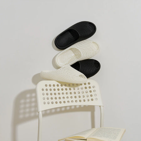 3D printed slippers, white and black open-toe slides with textured footbeds