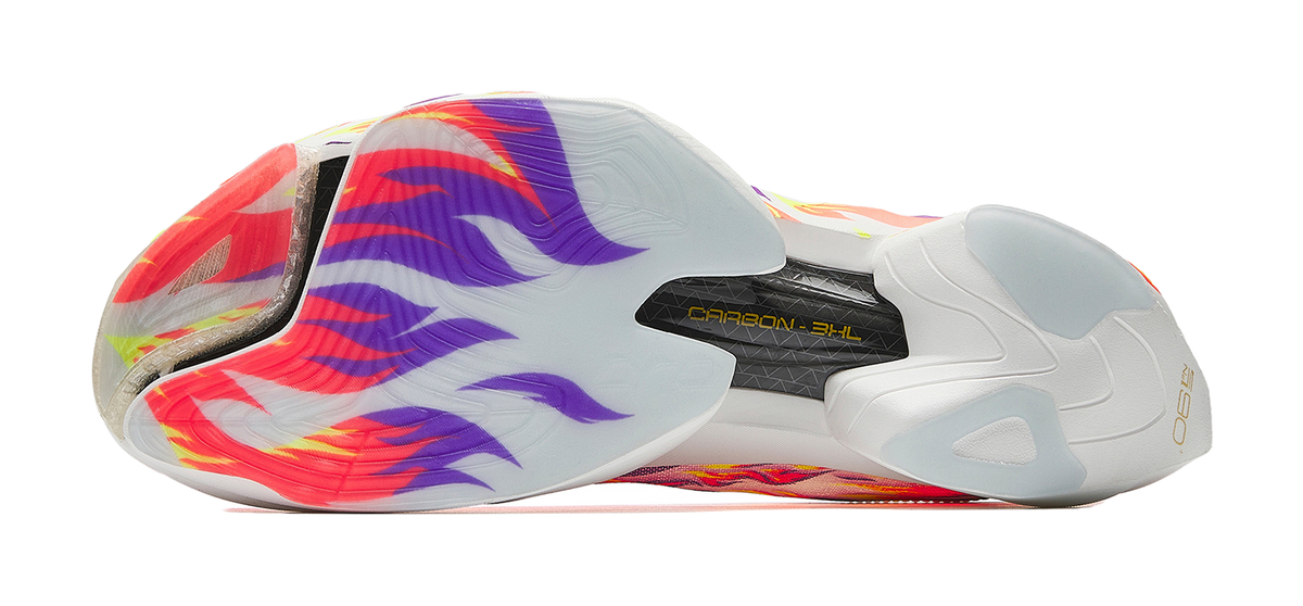 Marathon racing shoe outsole view, white upper with flame pattern and carbon plate