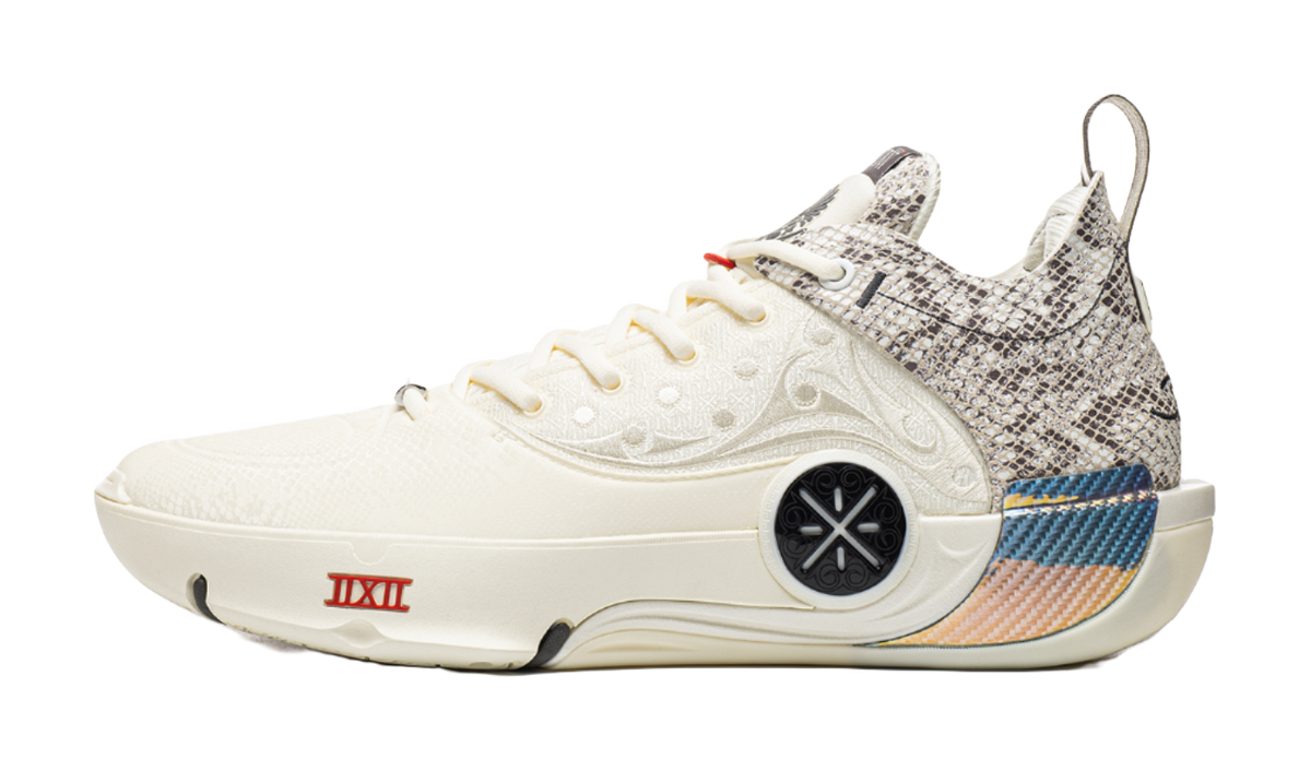 Ecru mid-top basketball shoe with knit collar, lace-up front, and rubber outsole