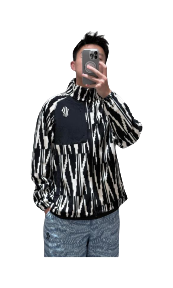 Front view of unisex zip-up sweatshirt jacket with black-and-white all-over pattern and chest logo.