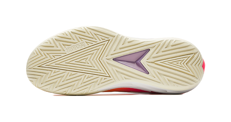 Basketball shoe outsole with textured zigzag traction and purple star detail