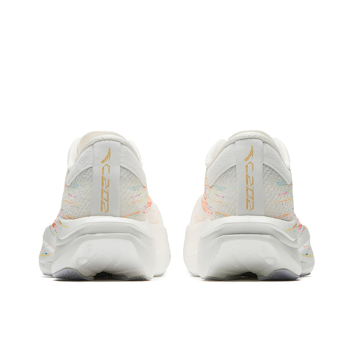 Women's running shoes, heel view with gold logo accents and multicolor speckled panels
