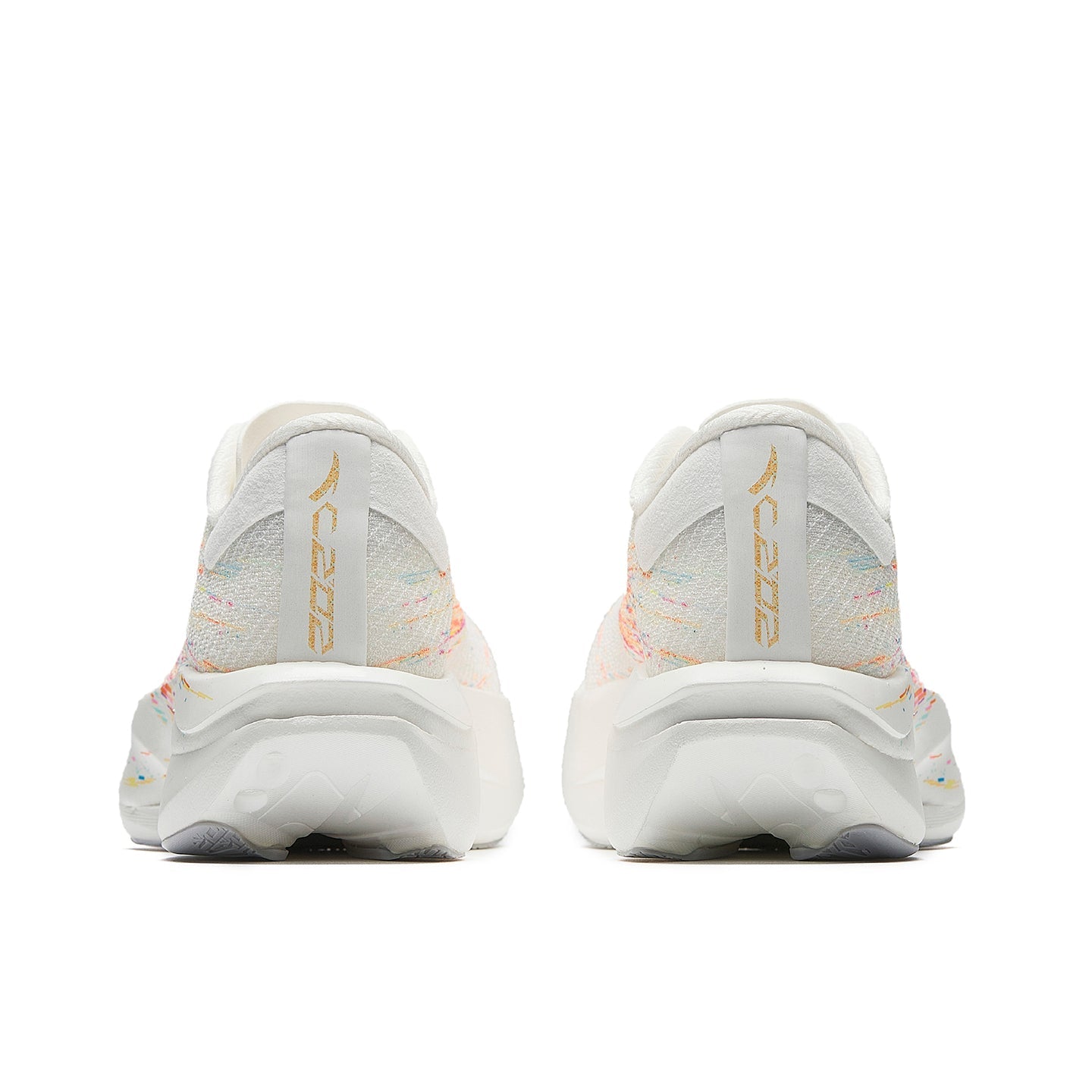 Women's running shoes, heel view with gold logo accents and multicolor speckled panels