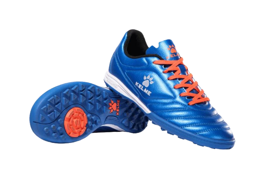 Kelme royal blue TF soccer shoe with orange laces; blue outsole with red traction