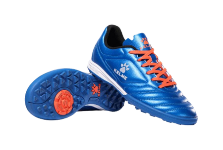 Kelme royal blue TF soccer shoe with orange laces; blue outsole with red traction