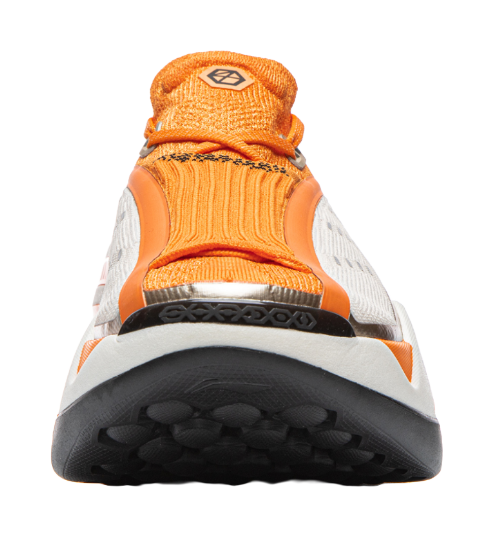 Orange Li-Ning Shadow heel and outsole close-up with black tread and white midsole support