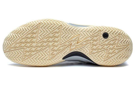 Men's basketball shoe outsole view with cream tread pattern and dark flex groove