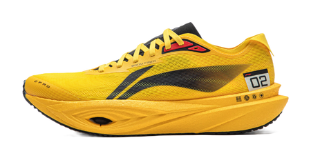 Yellow low-top running shoe with black stripe, lace-up, and contrast heel patch.