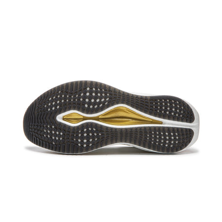 Men's running shoe outsole with textured black tread and gold center stripe, white edge