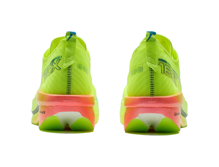 Neon green low-top running shoes, rear view with orange-red outsole and heel tab