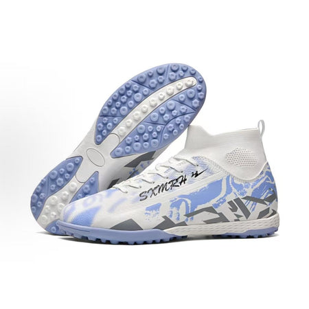 Unisex white and blue TF soccer shoe showing treaded turf outsole with multi-studs