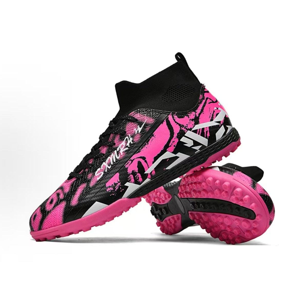 Soccer shoe with black and pink upper and turf studs on the rubber outsole