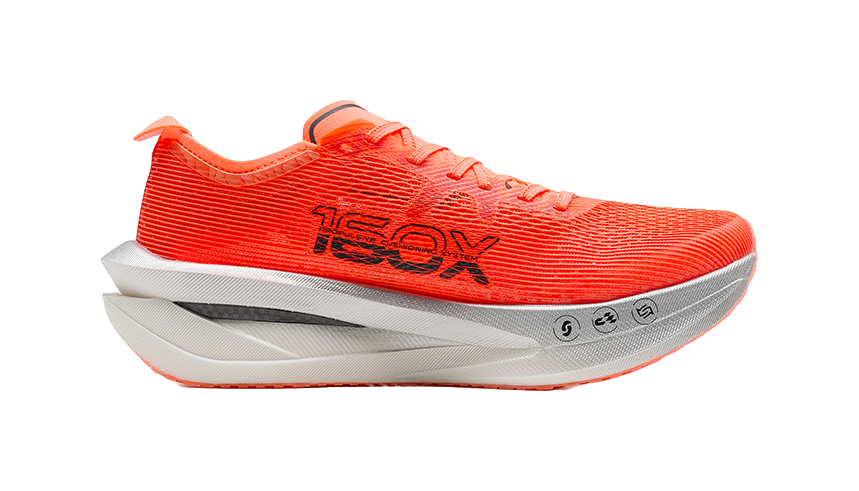 Women’s orange running shoes with textured knit upper and ‘XTEP’ logo