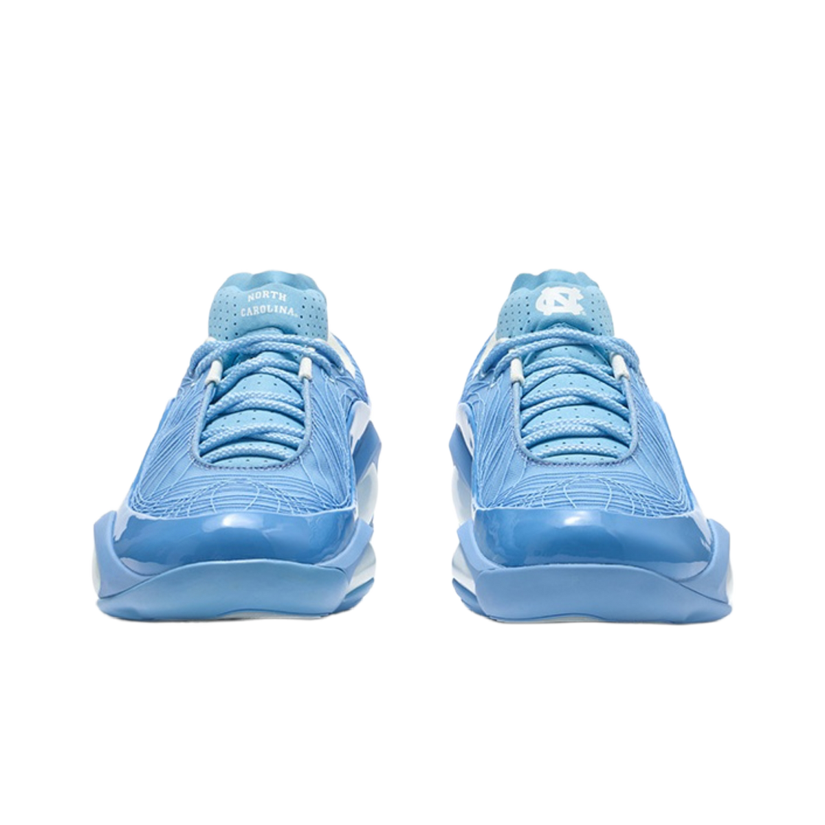 Front view of blue lace-up basketball shoes with perforated toe and tongue branding