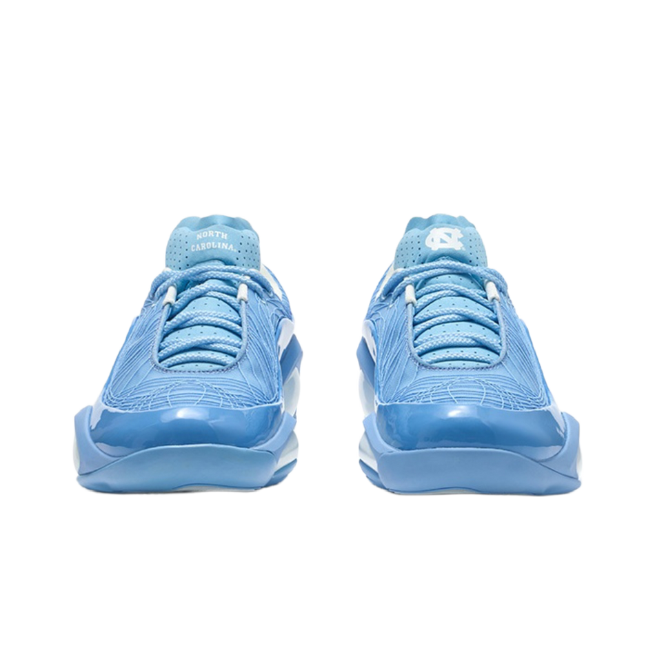 Front view of blue lace-up basketball shoes with perforated toe and tongue branding