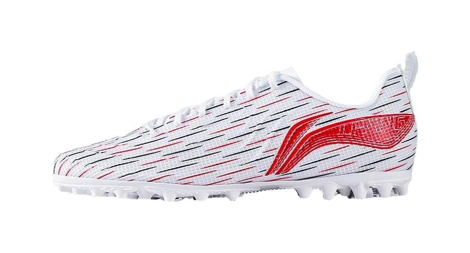 Youth soccer shoe with white upper and red flame panel; white cleated outsole