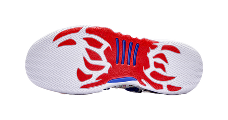 Basketball shoe outsole with white traction tread, red pattern areas, and blue accents