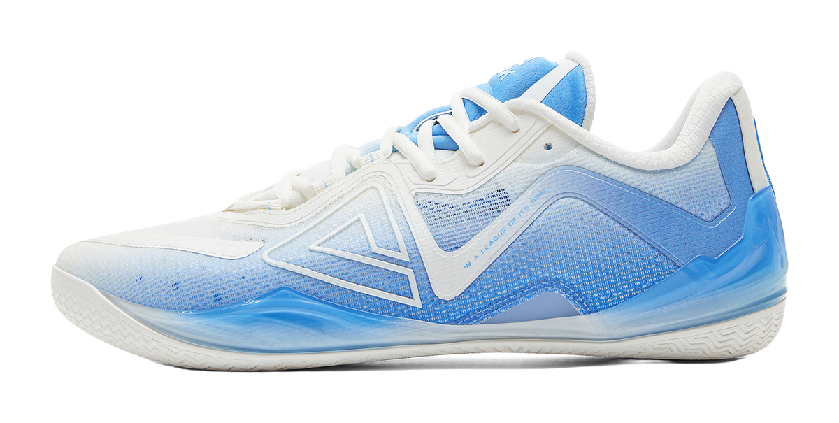 White and blue basketball shoe with lace-up front and angular logo overlays