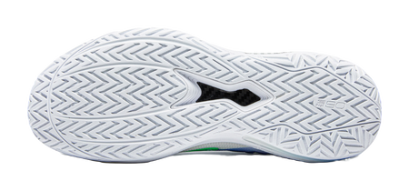 White basketball shoe outsole with textured traction pattern and zigzag grooves