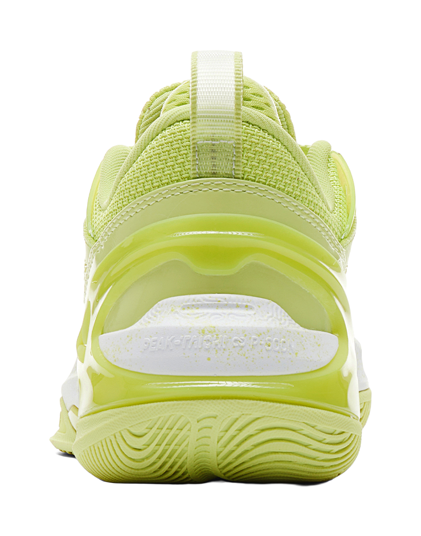 Light acid green basketball shoe heel view with padded back and textured cushioning sole
