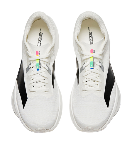 White lace-up running shoes with black side accent and colorful tongue logo.