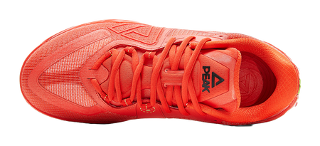 Orange-red lace-up basketball shoe, top view of tongue, laces, and patterned upper.