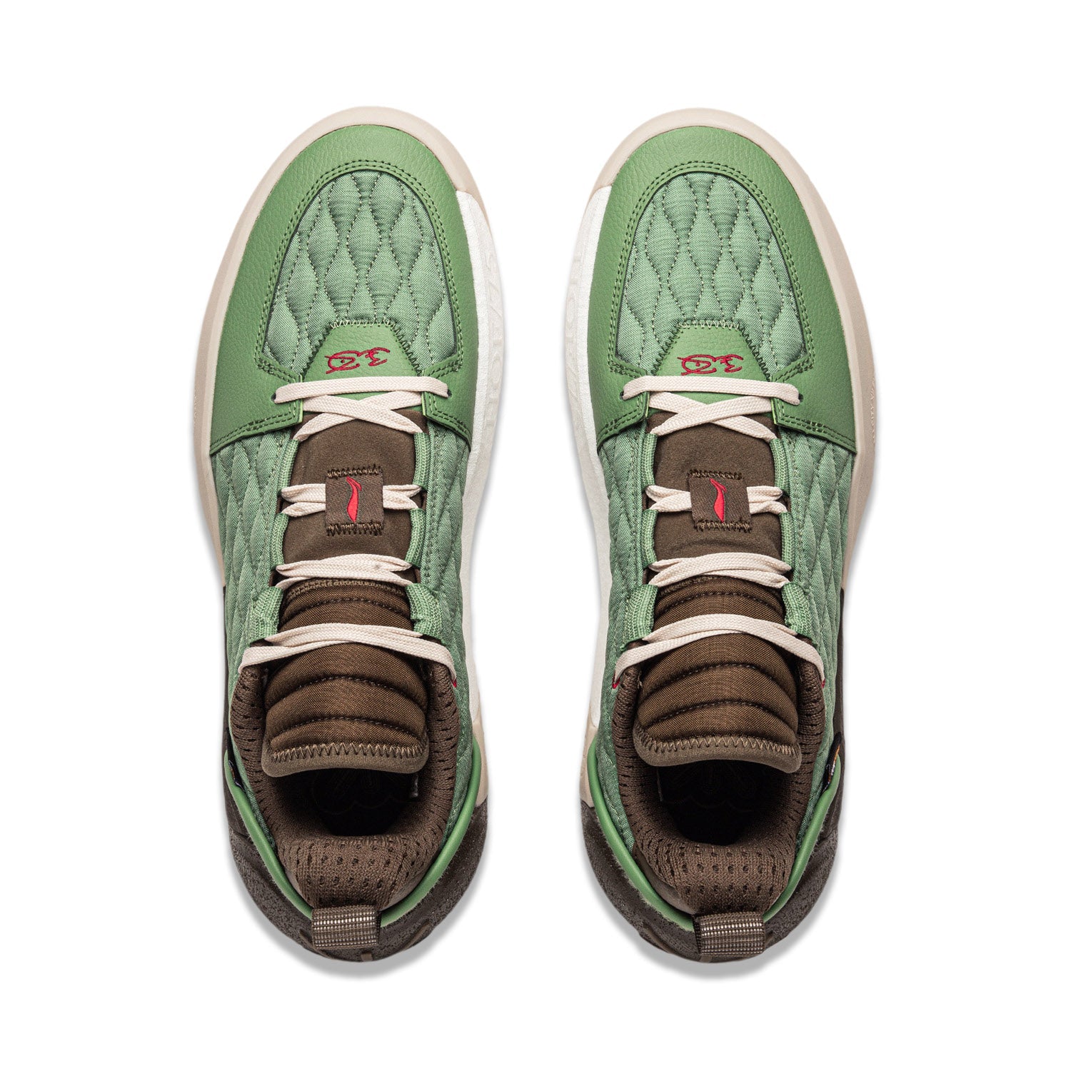 Pair of men's basketball shoes, moss green uppers with brown heel and light-colored laces