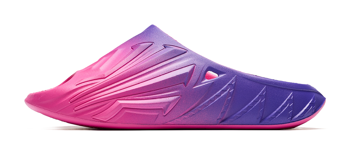 Unisex slide sandal with pink-to-purple gradient and molded logo side detail