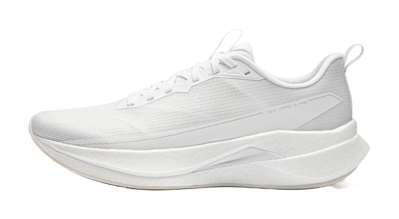 White running shoe with lace-up upper, textured panels, and thick cushioned sole