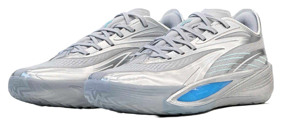 Pair of silver low-top basketball shoes, side view, blue side stripe
