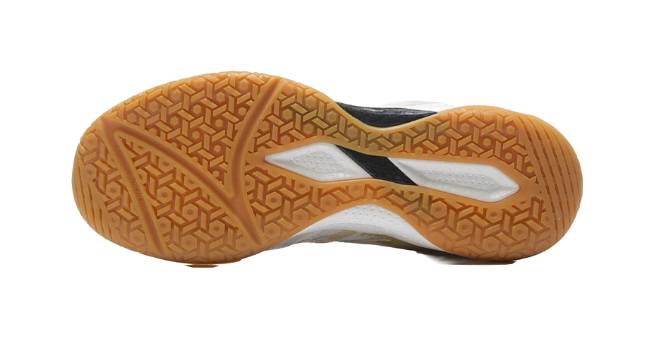 Table tennis shoe outsole with tan patterned grip and white midsole, underside view.