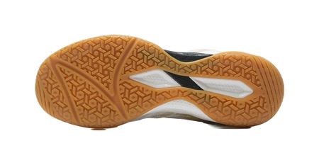 Table tennis shoe outsole with tan patterned grip and white midsole, underside view.
