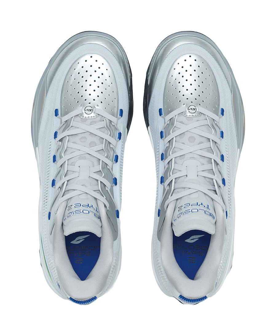 Silver basketball shoe pair, top view with perforated toe box and lace-up closure