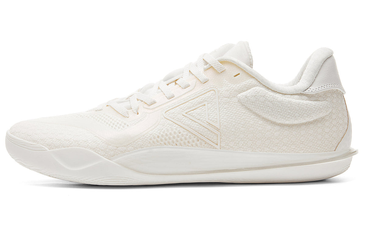 Milky white low-top basketball shoe with lace-up front and textured upper