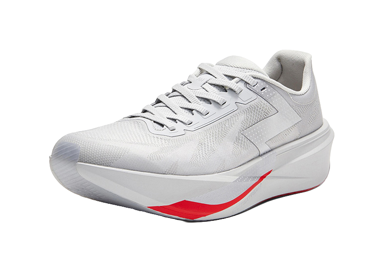 Gray low-top running shoe, lace-up with padded collar, red accent on side sole