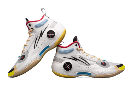 White mid-top basketball sneakers side-by-side, black logo, red collar, blue accents, yellow sole