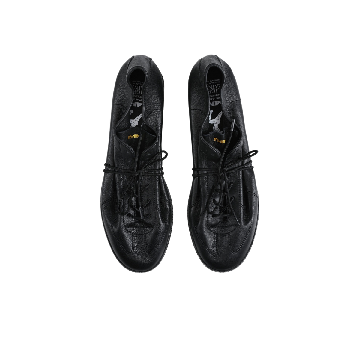 Pair of black lace-up low-top training sneakers with eyelets and perforated details.