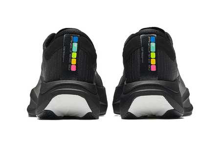 Black running shoes, rear view with padded heel collars and multicolor logo strip