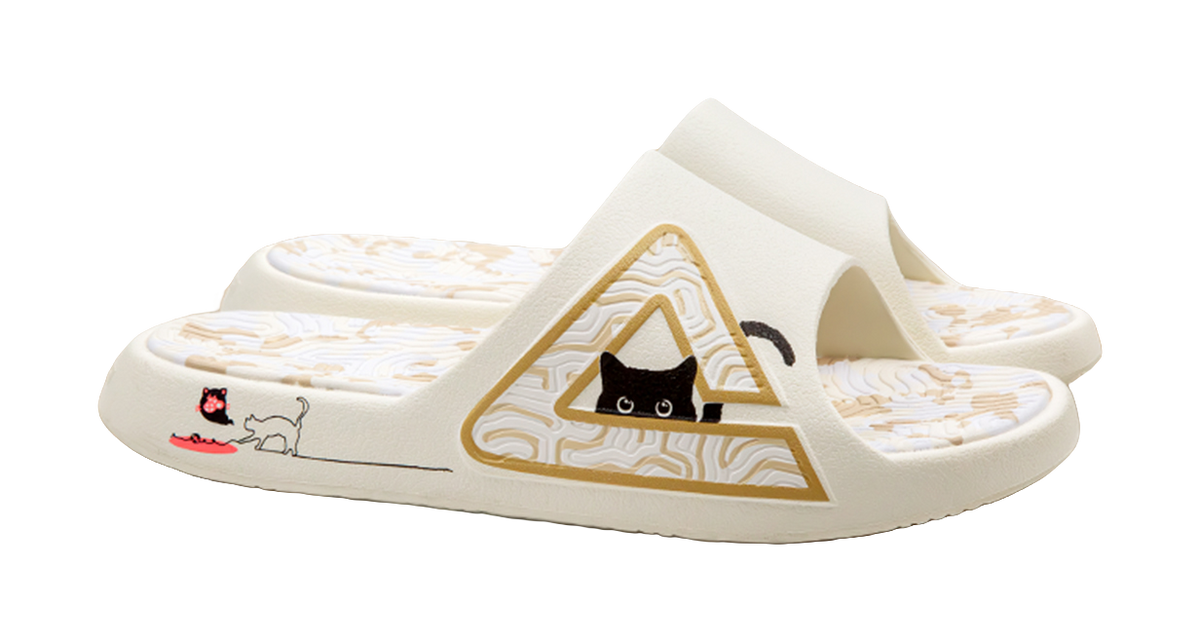 White slide sandal side view with triangular cat graphic and patterned straps
