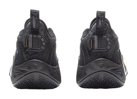 Black basketball shoes with heel tabs and treaded sole, gold vertical accents