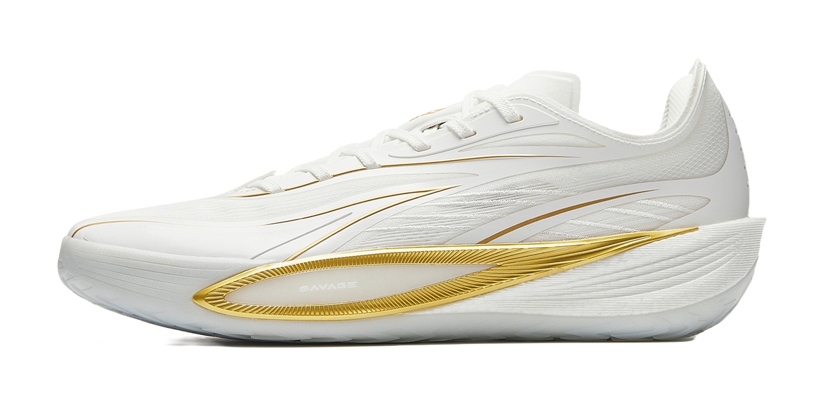 Men's white low-top basketball shoes with gold side stripe and lace-up design