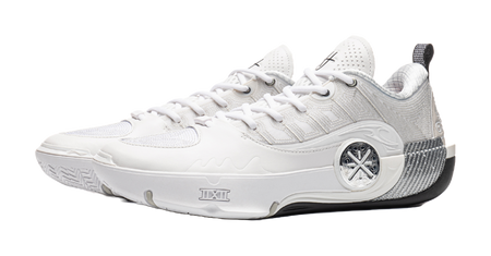 White basketball shoe with lace-up front, padded tongue, and round logo badge