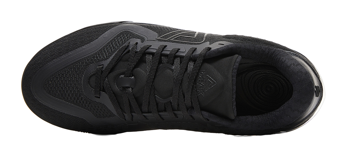 Black lace-up basketball shoe from above, textured panels and logo detail