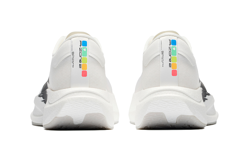 Men's low-top running shoes, white rear view with multicolor heel tab and cushioned sole