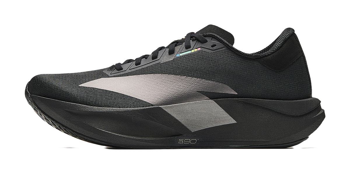 Men's low-top racing running shoes in black with gray panels and lace-up closure
