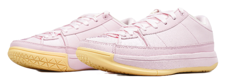 Pink low-top basketball shoes, side view, with white laces and white-pink panels