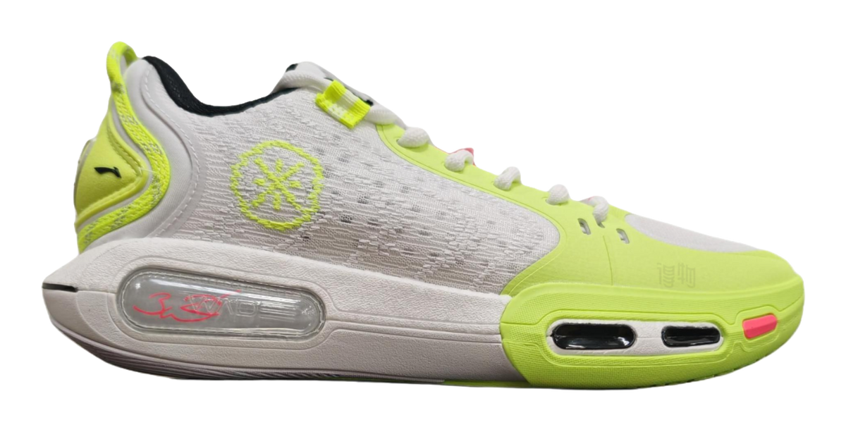 Neon green and white basketball shoe side view with air-window details