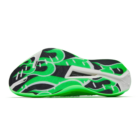 Marathon racing shoe outsole, green and black traction pattern with white midfoot panel.
