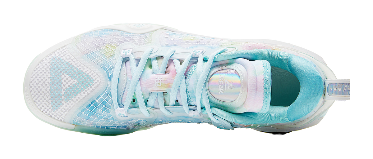 Light blue basketball shoe upper with lace area, pastel accents, and white toe box